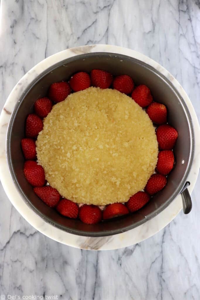 Fraisier cake is a traditional French strawberry cake, consisting of two layers of genoise sponge, filled with a silky delicious vanilla mousseline cream and fresh strawberries.