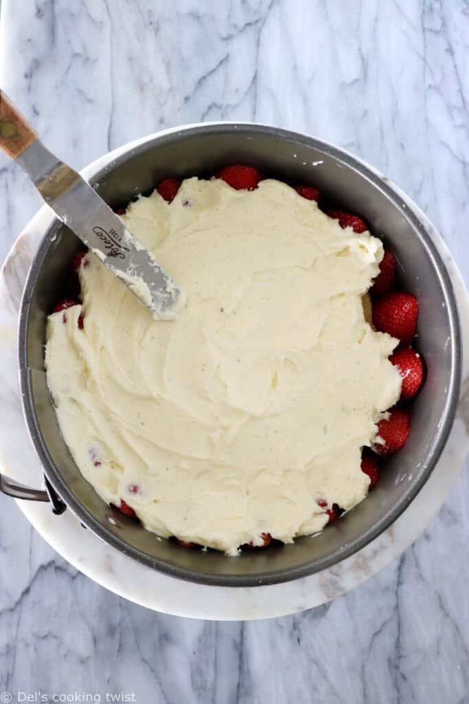 Fraisier cake is a traditional French strawberry cake, consisting of two layers of genoise sponge, filled with a silky delicious vanilla mousseline cream and fresh strawberries.