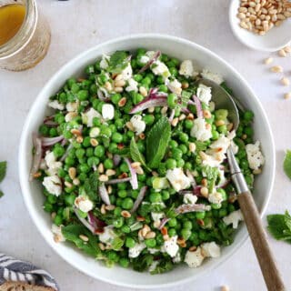 This spring pea salad with goat cheese salad is a vibrant salad recipe, healthy, nutritious, and loaded with farmers market produce.