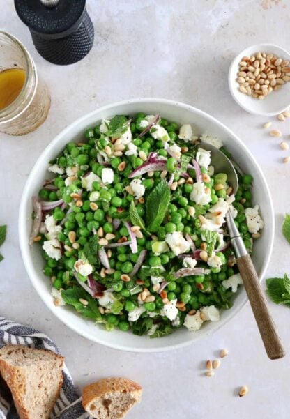 This spring pea salad with goat cheese salad is a vibrant salad recipe, healthy, nutritious, and loaded with farmers market produce.