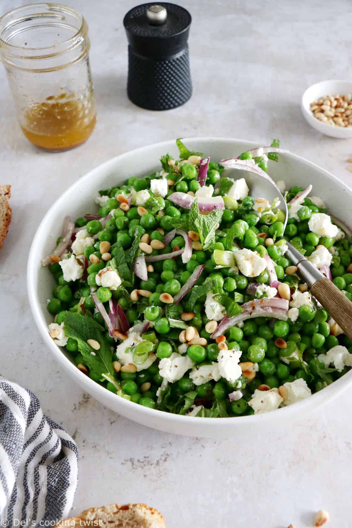 This spring pea salad with goat cheese salad is a vibrant salad recipe, healthy, nutritious, and loaded with farmers market produce.