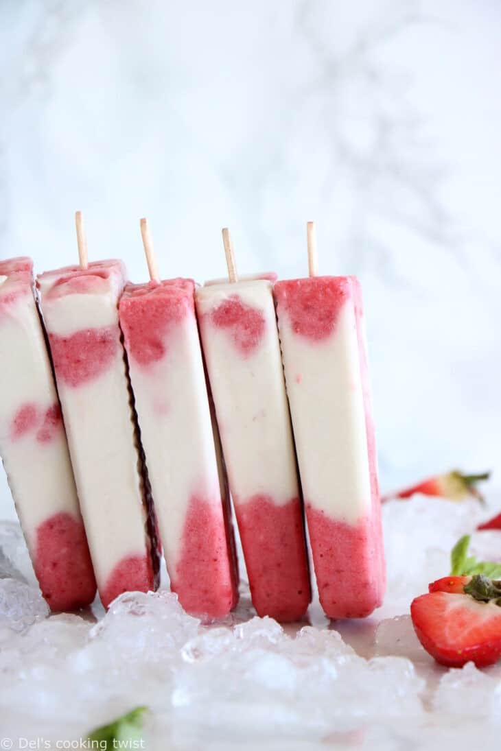 Les popsicles marbrés à la fraise et au lait de coco, c’est la petite douceur idéale pour l’été. Réalisés avec 3 ingrédients seulement, ils sont colorés, fruités et crémeux à la fois. Une recette vegan et sucrée naturellement.