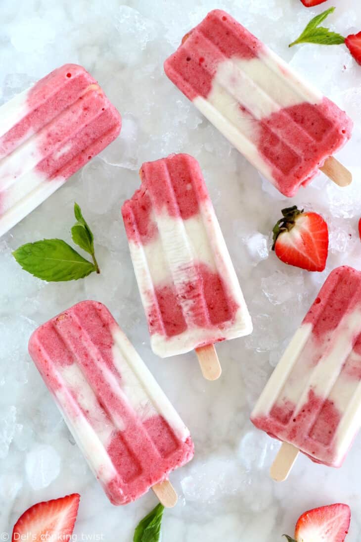 Les popsicles marbrés à la fraise et au lait de coco, c’est la petite douceur idéale pour l’été. Réalisés avec 3 ingrédients seulement, ils sont colorés, fruités et crémeux à la fois. Une recette vegan et sucrée naturellement.