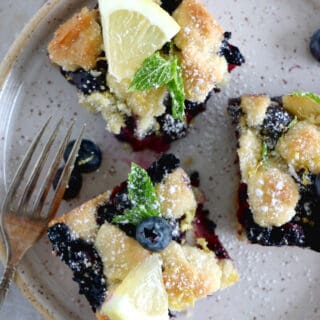 Easy blueberry crumble bars are loaded with sweet, juicy blueberries, and a delicious buttery crumble, shortbread-like.