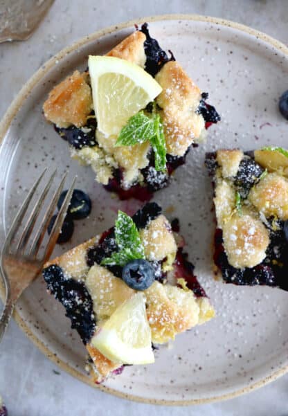 Easy blueberry crumble bars are loaded with sweet, juicy blueberries, and a delicious buttery crumble, shortbread-like.