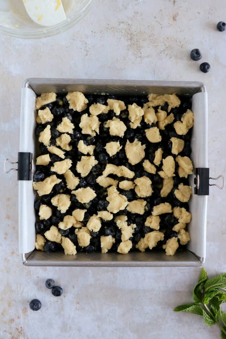 Easy blueberry crumble bars are loaded with sweet, juicy blueberries, and a delicious buttery crumble, shortbread-like.