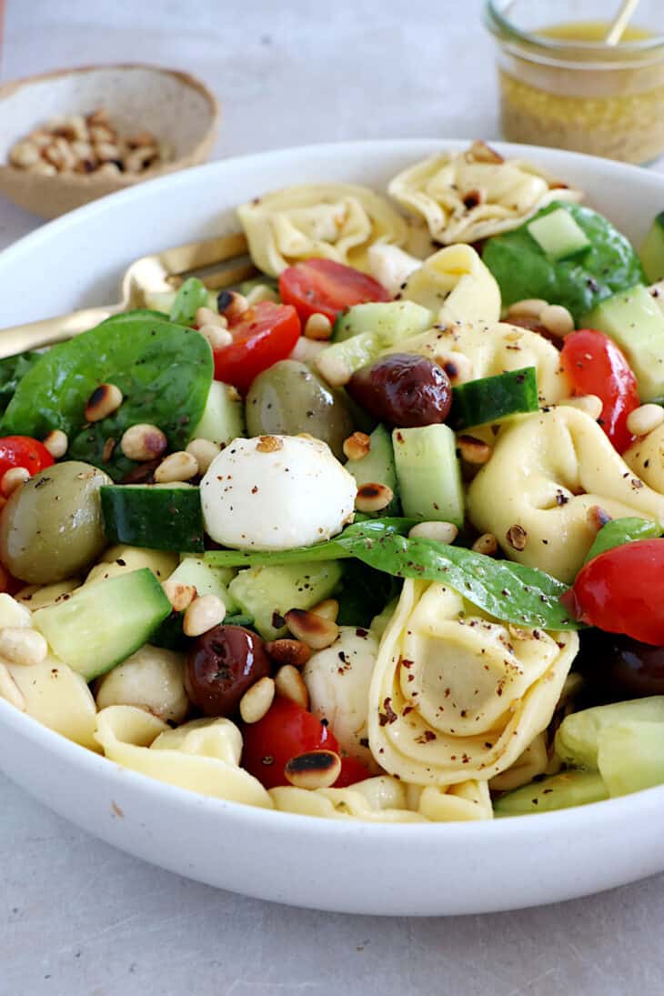 This 10-minute Italian tortellini pasta salad is loaded with fresh veggies, mozzarella pearls and pillowy tortellini pasta.