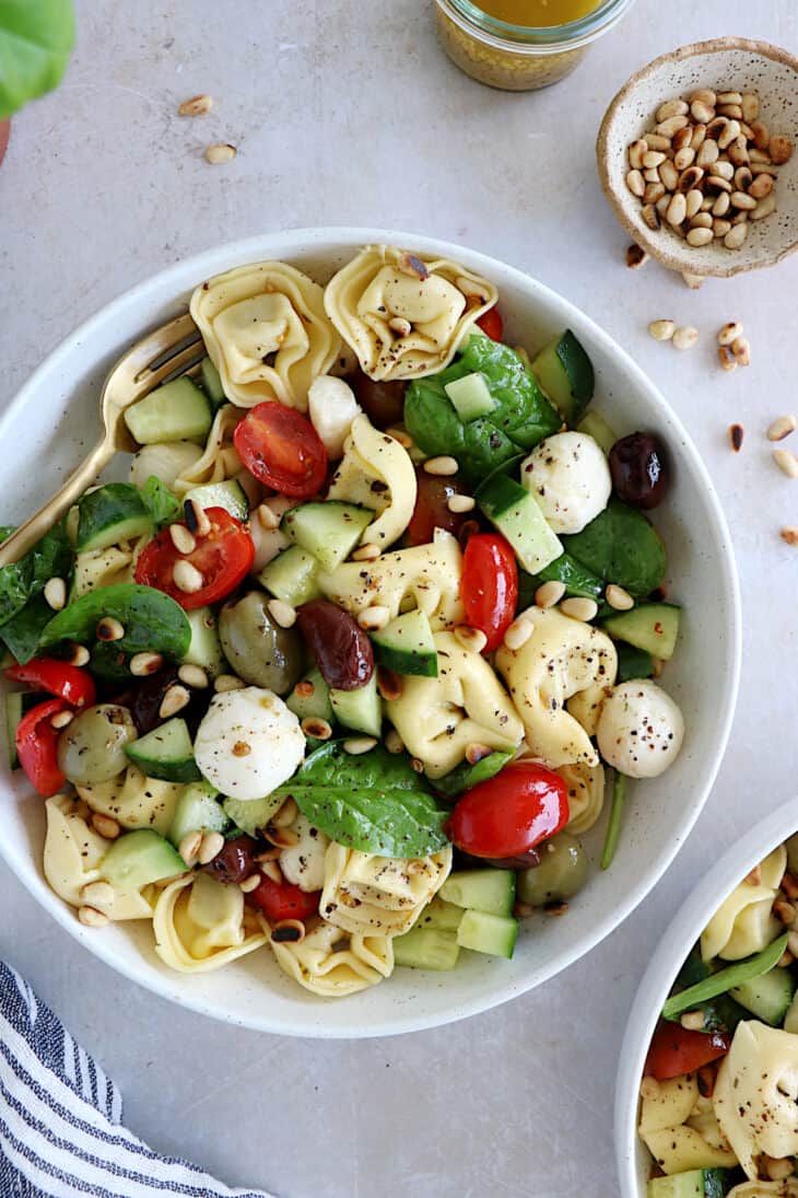 This 10-minute Italian tortellini pasta salad is loaded with fresh veggies, mozzarella pearls and pillowy tortellini pasta.