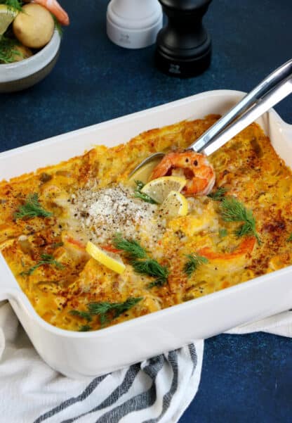 Swedish seafood casserole with saffron (Fiskgryta) is a fish stew consisting of a creamy saffron sauce with various pieces of seafood.