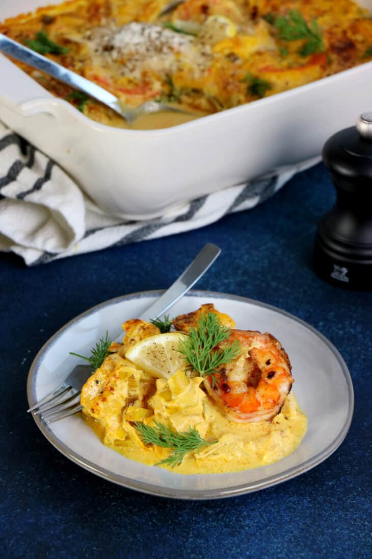 Swedish seafood casserole with saffron (Fiskgryta) is a fish stew consisting of a creamy saffron sauce with various pieces of seafood.