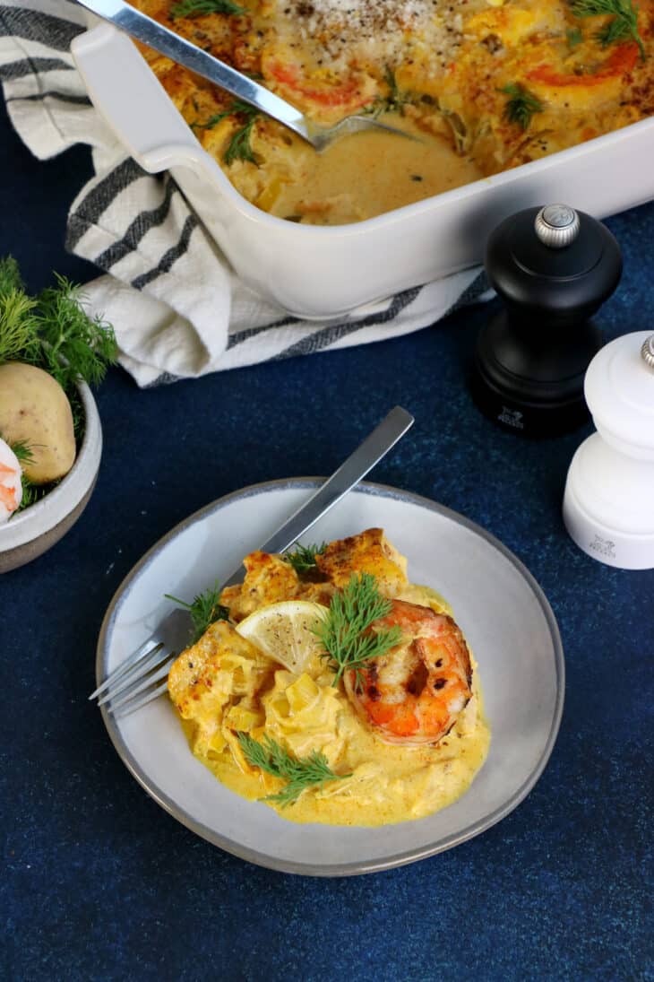 Swedish seafood casserole with saffron (Fiskgryta) is a fish stew consisting of a creamy saffron sauce with various pieces of seafood.
