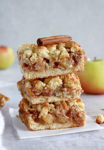 You'll love these EASY apple crumble bars! They feature a simple shortbread crust for both the bottom and the top crumble part, and a soft apple cinnamon filling inside.