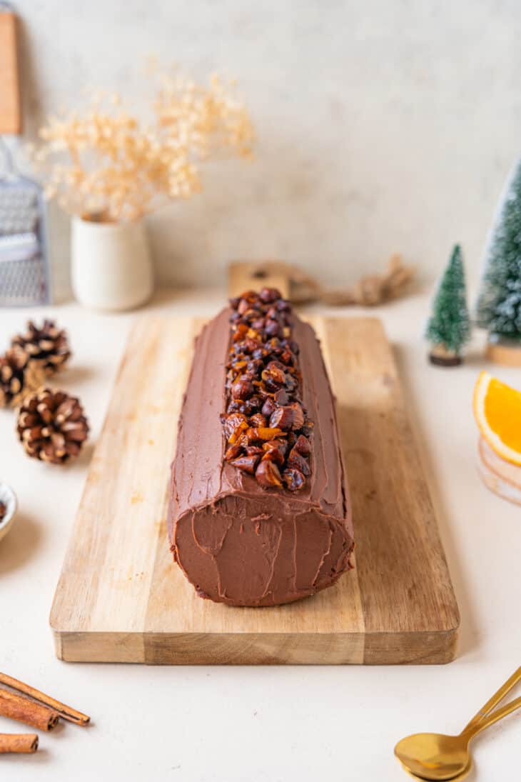 This chocolate orange yule log (or bûche de Noël in French) is a traditional Christmas dessert in France. It consists of a light sponge cake, subtly flavored with orange, and a generous chocolate ganache.