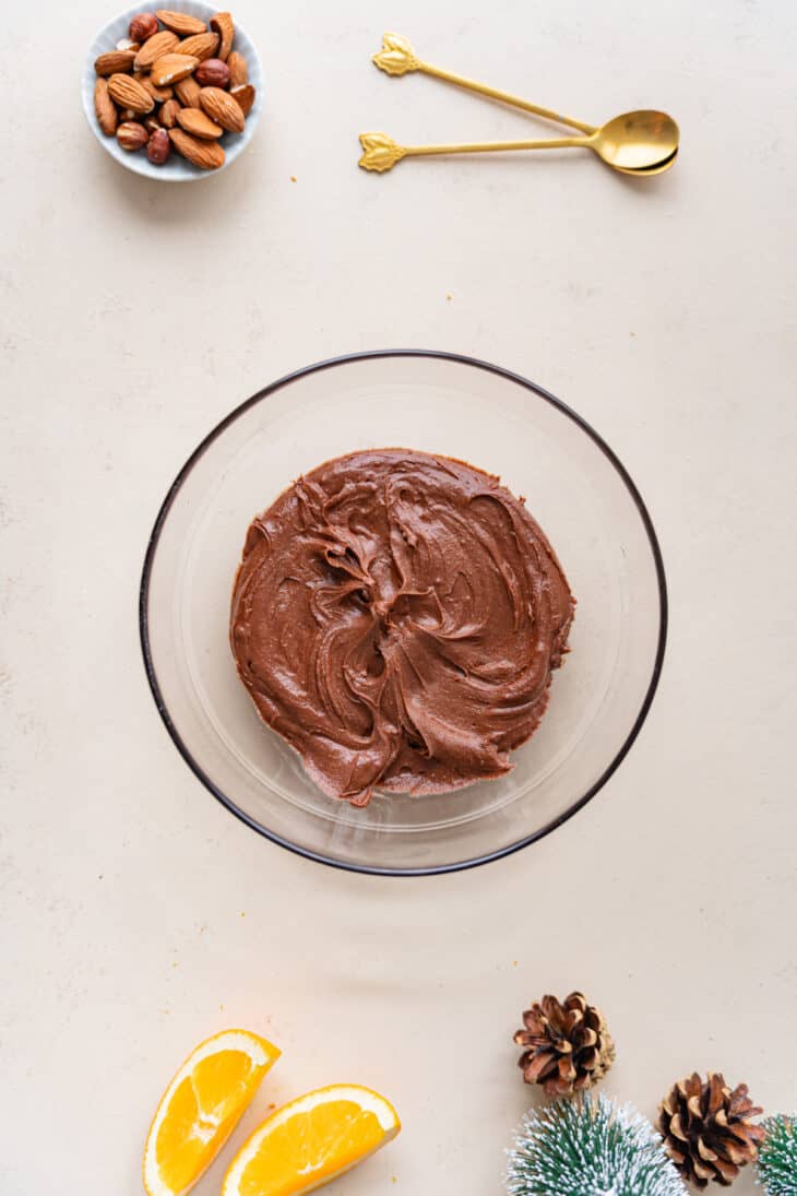 This chocolate orange yule log (or bûche de Noël in French) is a traditional Christmas dessert in France. It consists of a light sponge cake, subtly flavored with orange, and a generous chocolate ganache.