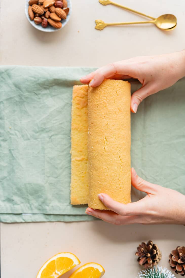 This chocolate orange yule log (or bûche de Noël in French) is a traditional Christmas dessert in France. It consists of a light sponge cake, subtly flavored with orange, and a generous chocolate ganache.