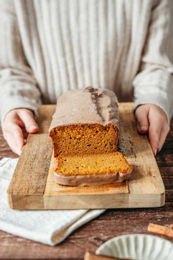 Here's the BEST pumpkin bread recipe. Extremely moist and tender, it's loaded with pumpkin spice flavors, and topped with a delicious cinnamon icing.