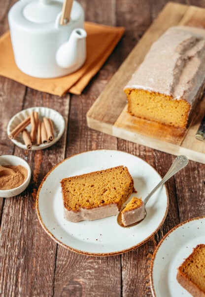 Here's the BEST pumpkin bread recipe. Extremely moist and tender, it's loaded with pumpkin spice flavors, and topped with a delicious cinnamon icing.