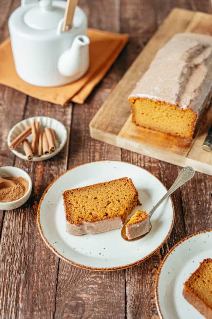 Here's the BEST pumpkin bread recipe. Extremely moist and tender, it's loaded with pumpkin spice flavors, and topped with a delicious cinnamon icing.