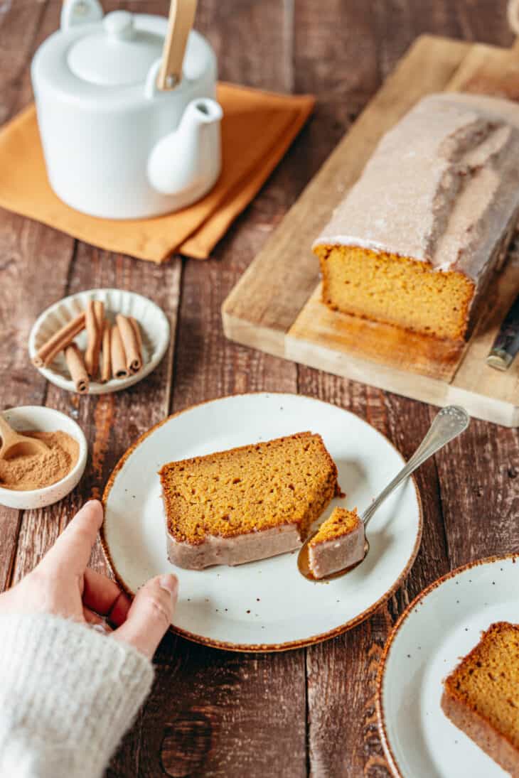 Here's the BEST pumpkin bread recipe. Extremely moist and tender, it's loaded with pumpkin spice flavors, and topped with a delicious cinnamon icing.