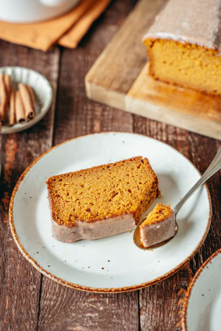 Here's the BEST pumpkin bread recipe. Extremely moist and tender, it's loaded with pumpkin spice flavors, and topped with a delicious cinnamon icing.