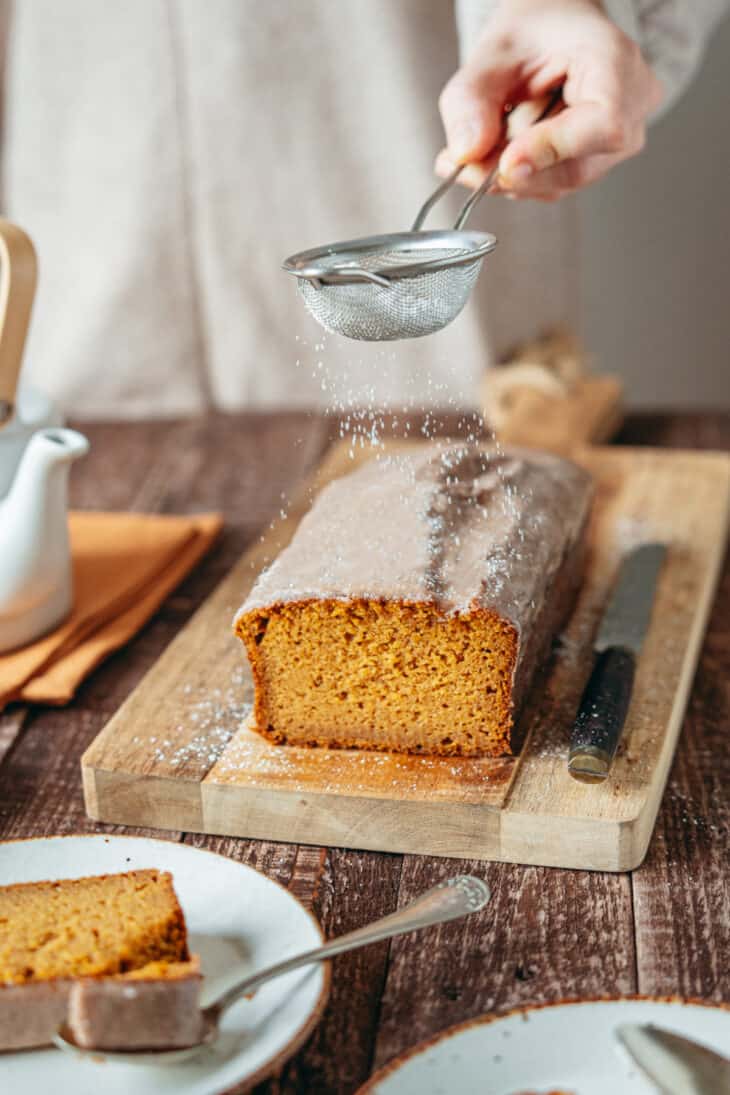 Here's the BEST pumpkin bread recipe. Extremely moist and tender, it's loaded with pumpkin spice flavors, and topped with a delicious cinnamon icing.