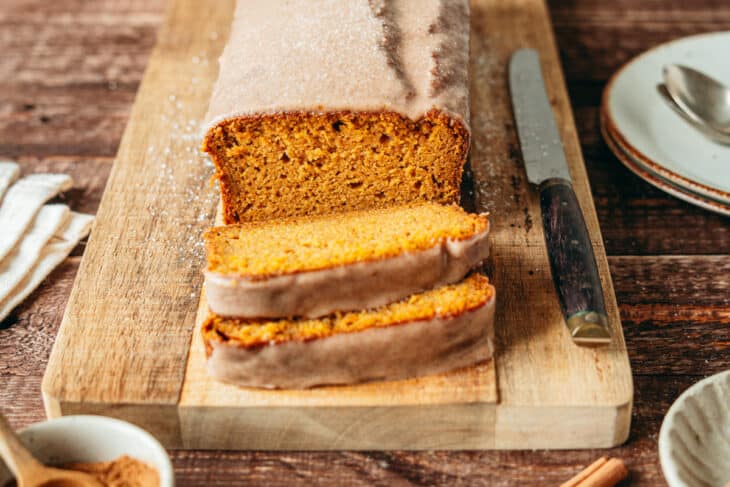 Here's the BEST pumpkin bread recipe. Extremely moist and tender, it's loaded with pumpkin spice flavors, and topped with a delicious cinnamon icing.