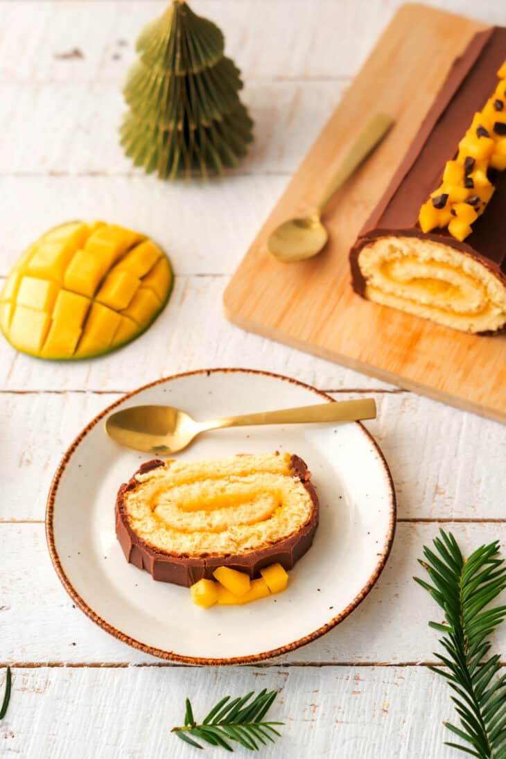 This chocolate mango yule log will bring some subtle exotic flavors to your traditional Christmas dessert.