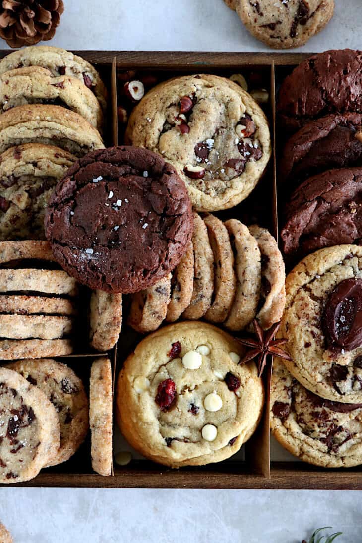 This festive Christmas cookie box is filled with your favorite cookies, ranging from chocolate brownie cookies, shortbread cookies, white chocolate and cranberry cookies, and more.