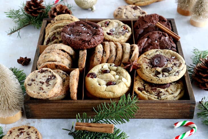 This festive Christmas cookie box is filled with your favorite cookies, ranging from chocolate brownie cookies, shortbread cookies, white chocolate and cranberry cookies, and more.