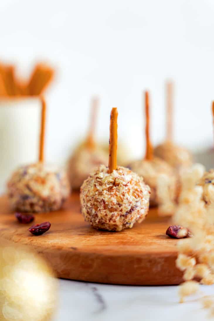 These festive cranberry pecan cheese balls are the perfect bite-sized appetizer for any gathering party during the holiday season.