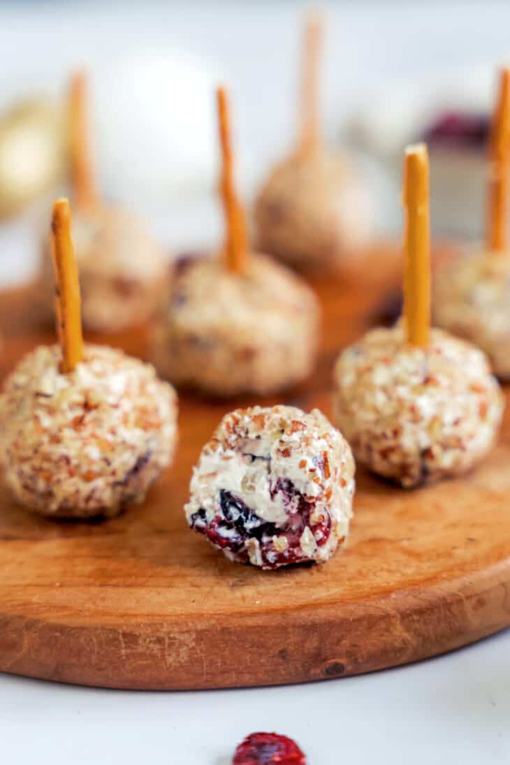 These festive cranberry pecan cheese balls are the perfect bite-sized appetizer for any gathering party during the holiday season.