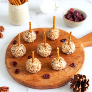 These festive cranberry pecan cheese balls are the perfect bite-sized appetizer for any gathering party during the holiday season.