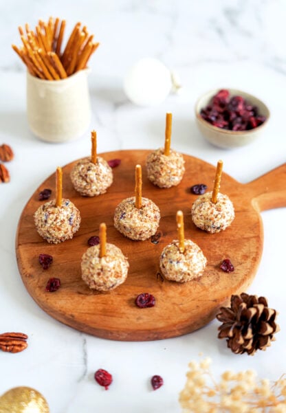 These festive cranberry pecan cheese balls are the perfect bite-sized appetizer for any gathering party during the holiday season.