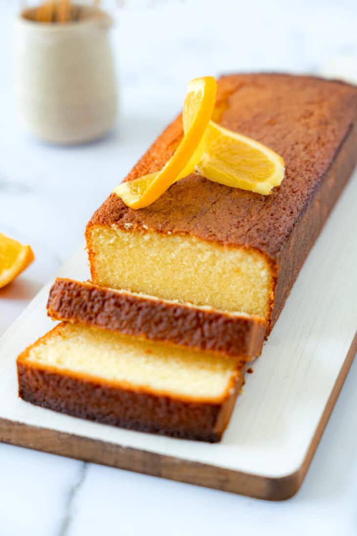 Fragrant, moist, and tender Orange Pound Cake flavored with freshly squeezed orange juice and zest. This easy recipe is a winner.