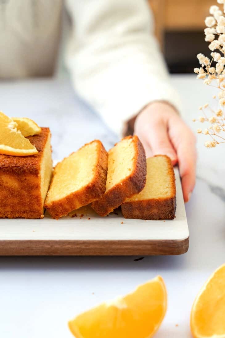 Fragrant, moist, and tender Orange Pound Cake flavored with freshly squeezed orange juice and zest. This easy recipe is a winner.