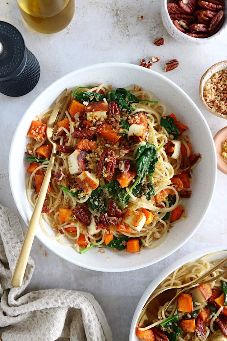 Up your pasta by making this lemony winter squash pasta with halloumi, baby spinach, and a crispy pecan-breadcrumb.