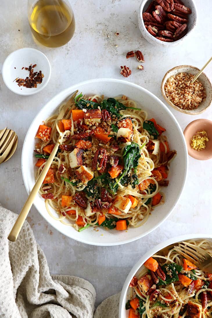 Up your pasta by making this lemony winter squash pasta with halloumi, baby spinach, and a crispy pecan-breadcrumb.