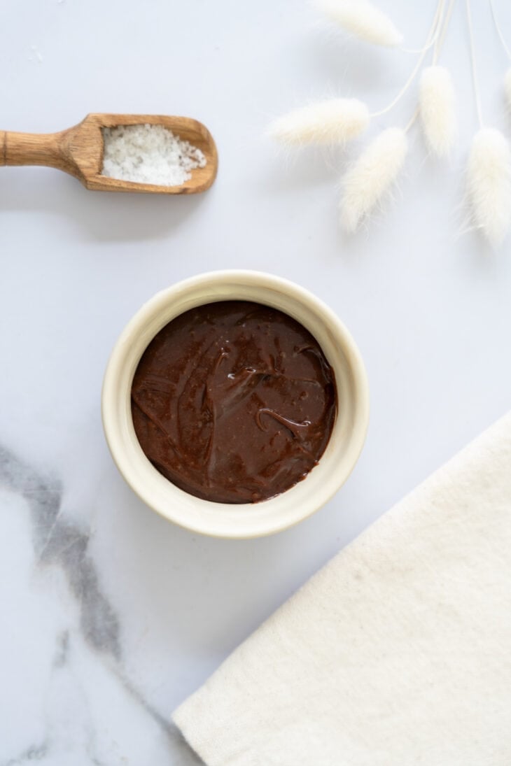 Molten chocolate lava cake is a decadent individual dessert, with a mind-blowing gooey chocolate center that flows out when you slice it.