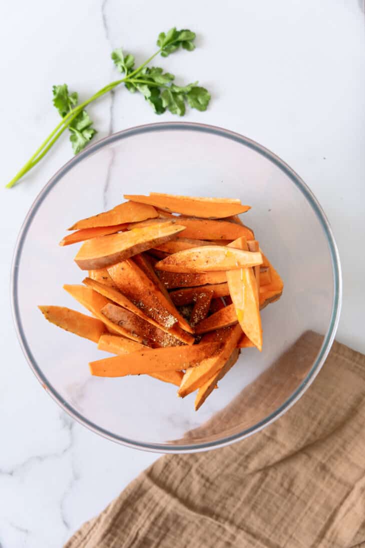 Sweet potato fries are so addictive! Crispy and slightly charred on the edges, they make a great side or snack to enjoy with an avocado dip.