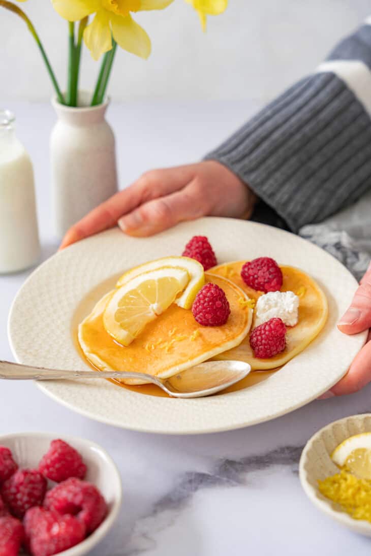 Light, fluffy and extremely moist lemon ricotta pancakes are the ultimate pancakes recipe. They are loaded with refreshing and lemony flavors.