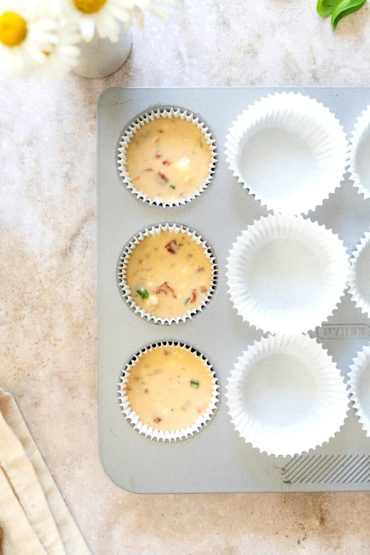 These sun-dried tomato savory muffins with goat cheese make a fantastic and festive one-bite appetizer everyone loves.