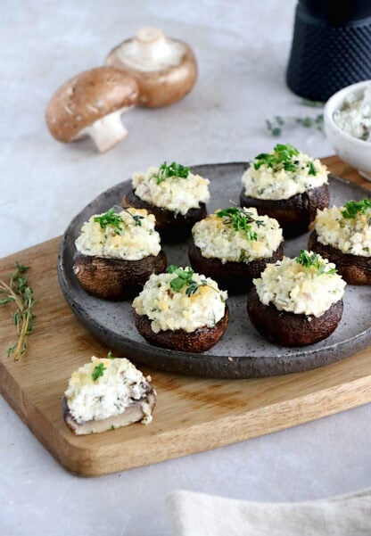 Goat cheese stuffed mushrooms make an easy holiday appetizer. Filled with cheese, herbs and shallots, they disappear within minutes.