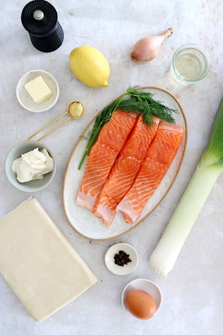 Puff pastry salmon wellington features a crispy golden puff pastry filled with a creamy leek-salmon filling, seasoned to perfection.
