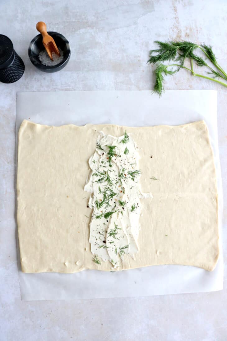 Puff pastry salmon wellington features a crispy golden puff pastry filled with a creamy leek-salmon filling, seasoned to perfection.
