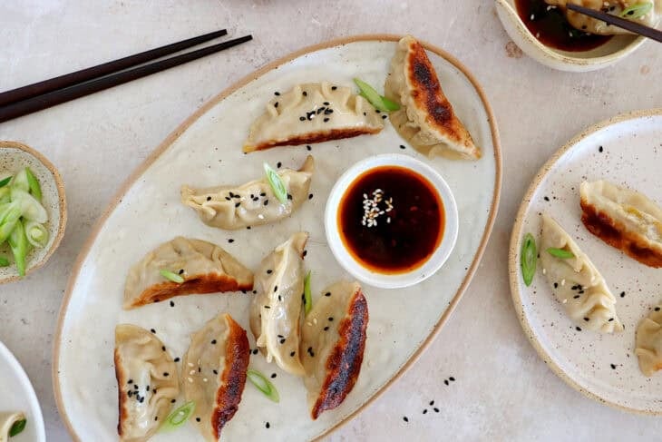 Learn how to make vegetable gyoza from scratch! These Japanese appetizers are tender, crispy on the bottom and loaded with umami flavors.