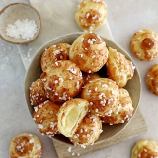 Learn how to make French chouquettes from scratch from the comfort of your home! These small hollow choux puffs topped with pearl sugar are sweet, delicate, and perfect as an afternoon snack.