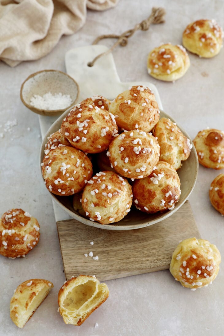 Learn how to make French chouquettes from scratch from the comfort of your home! These small hollow choux puffs topped with pearl sugar are sweet, delicate, and perfect as an afternoon snack.