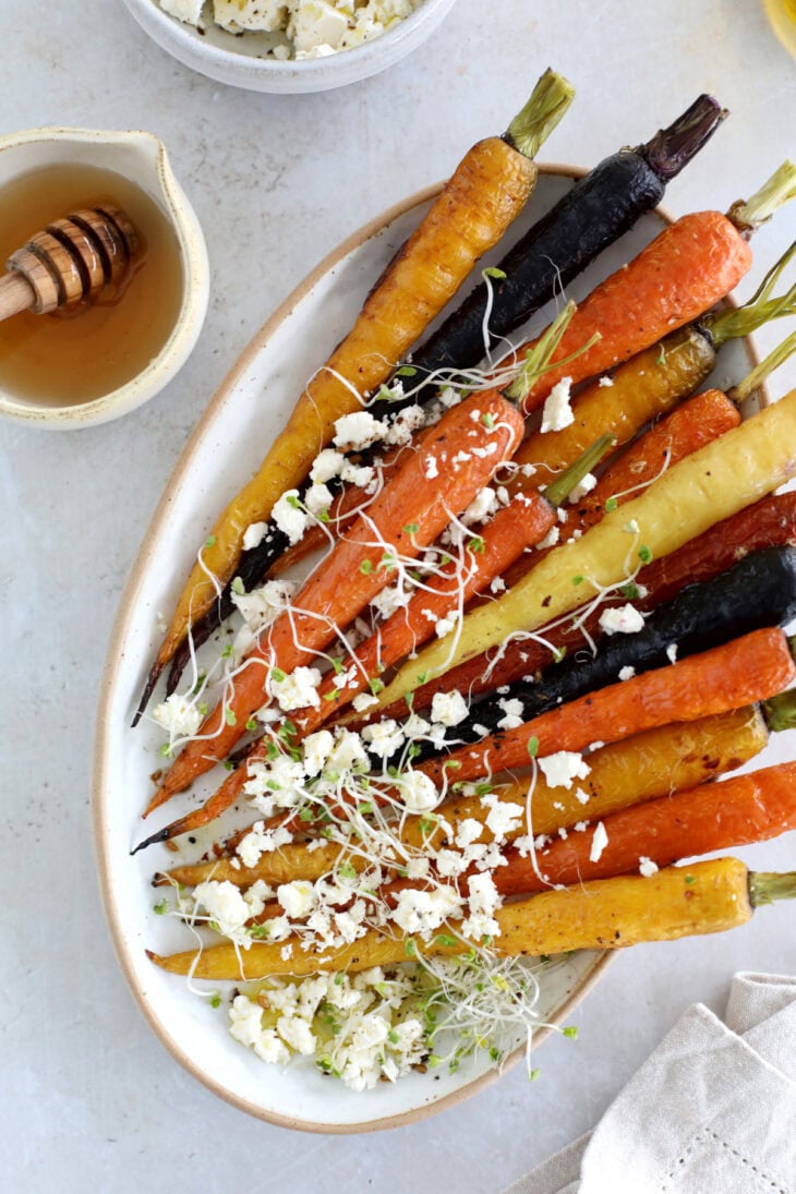 These roasted carrots with feta make a simple vegetarian side for Easter, Thanksgiving, and every occasion in between!