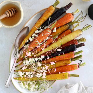 These roasted carrots with feta make a simple vegetarian side for Easter, Thanksgiving, and every occasion in between!