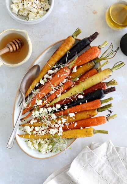 These roasted carrots with feta make a simple vegetarian side for Easter, Thanksgiving, and every occasion in between!